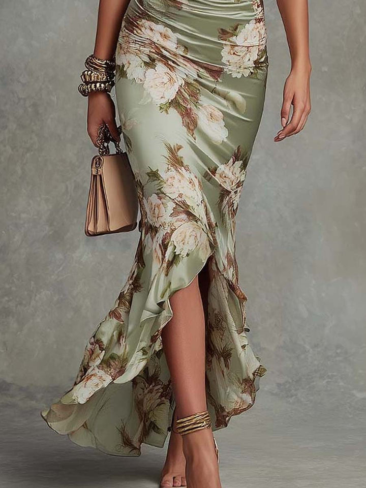Anna - Asymmetrical long dress in green satin with V-neck, flared puff sleeves, and floral pattern